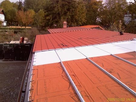 Azcorreta y Zárate instalación de tejas